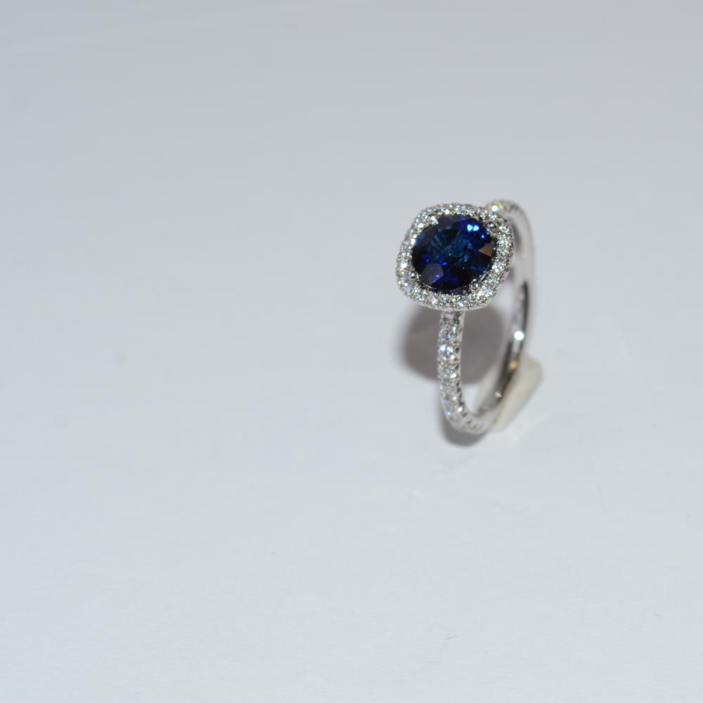 Halo Style Sapphire Diamond Ring
